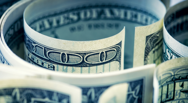 Dollar cost averaging - investissement programmé - illustration billets enroulés